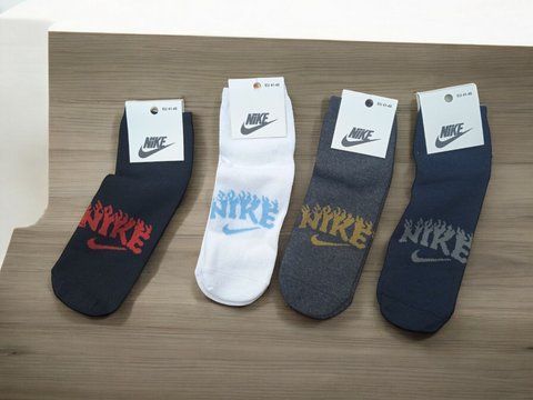 12 пар в упаковці шкарпетки середні 4 кольори NIKE 41-45 грн. 2486023869 фото