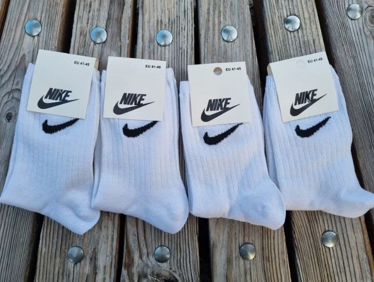 Шкарпетки NIKE 1 пара високі білі 41-45 р. 2326173525 фото